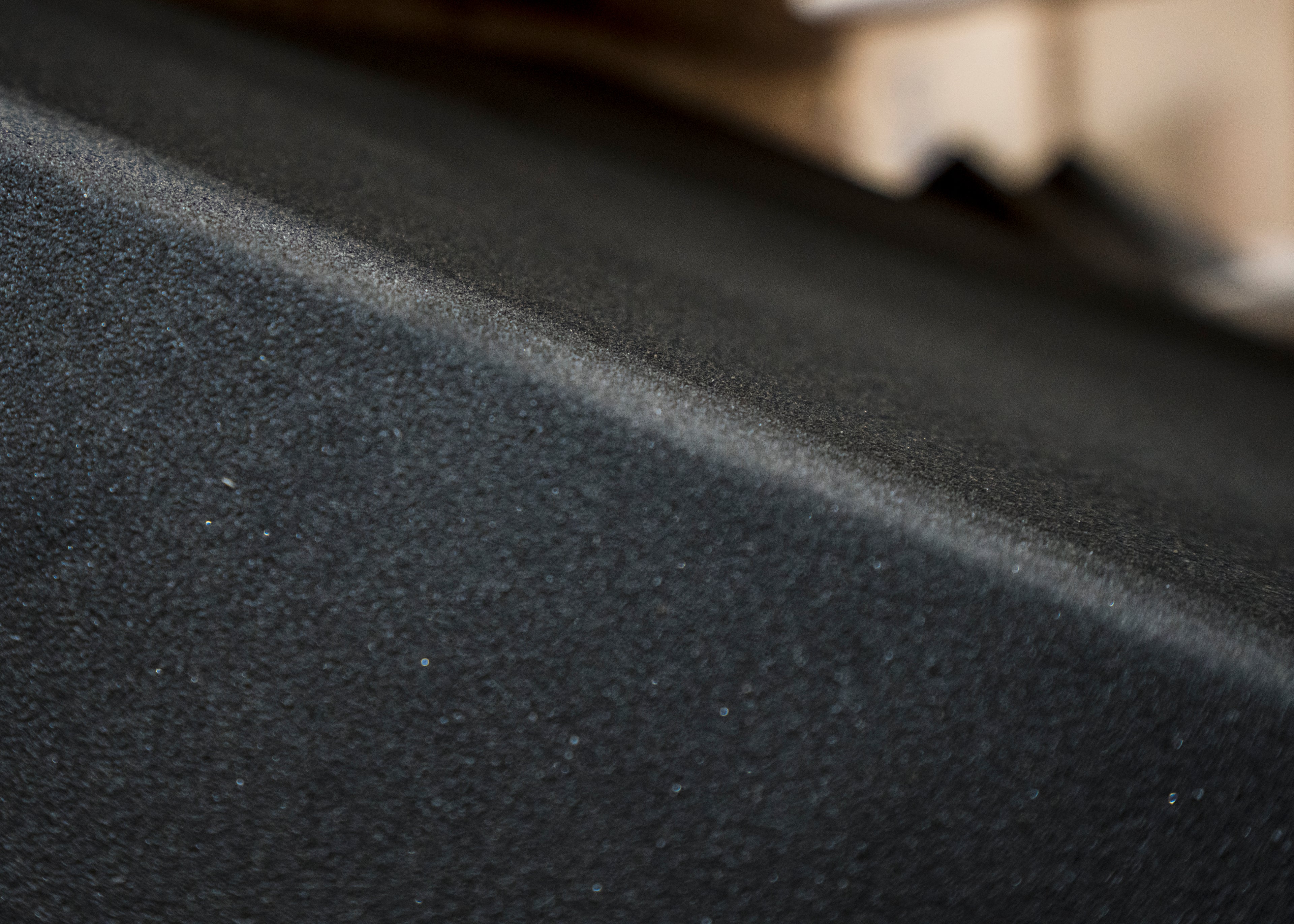 Close-up of a textured black surface